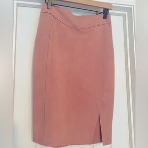 Size medium, knee length skirt with zipper back